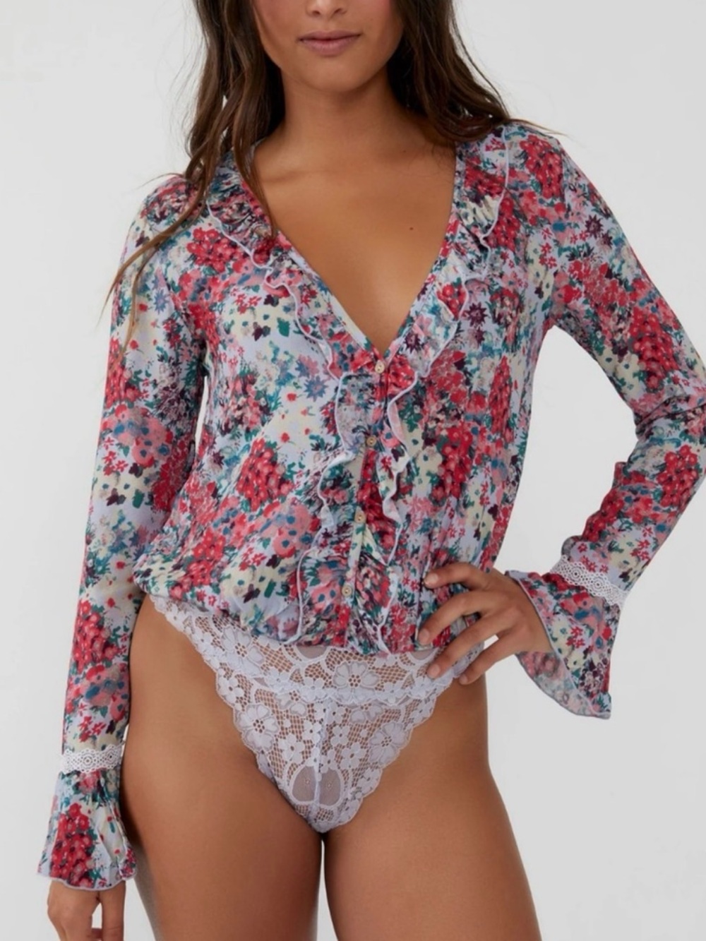 Free People Floral Ruffle Long Sleeve Bodysuit in White and Pink-Red